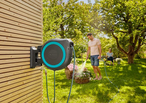 AquaOrganize™– O Suporte Retrátil que Une Praticidade e Organização no Seu Jardim!+ Mangueira de Brinde